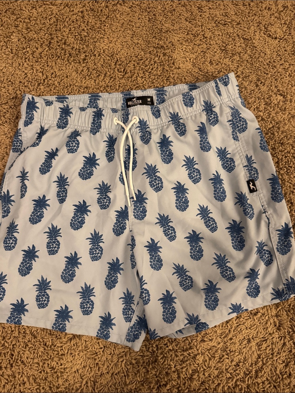 Hollister Men’s Light Blue Swim Trunks with Navy Pineapple Print